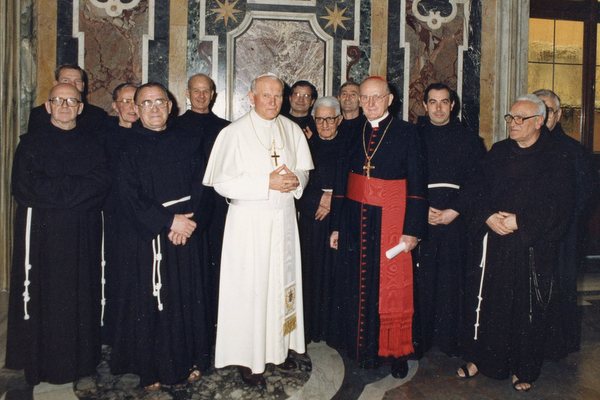 Fr. Cyprian Berens, OFM, directly behind and to the left of Pope John Paul II