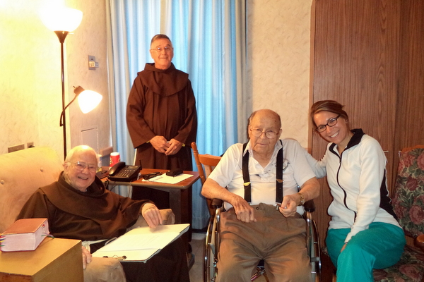 Br. Norbert Bertram (standing) visits friars Cyprian Berens, Valens Waldschmidt and their nurse at Little Sisters of the Poor