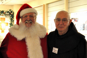Br. Dominic with Santa Claus at the Northgate Mall ministry last December